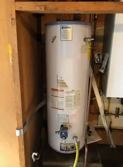 Installed tank water heater and connected pipework in the published BWH project gallery