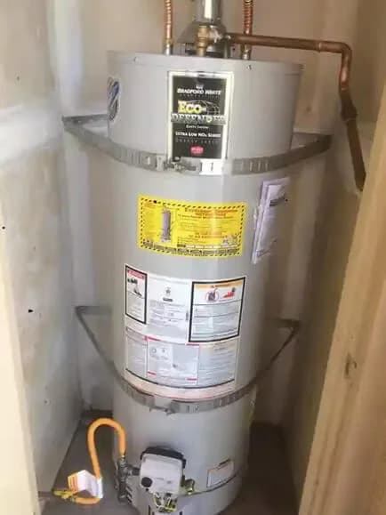 Installed tank water heater and connected pipework in the published BWH project gallery