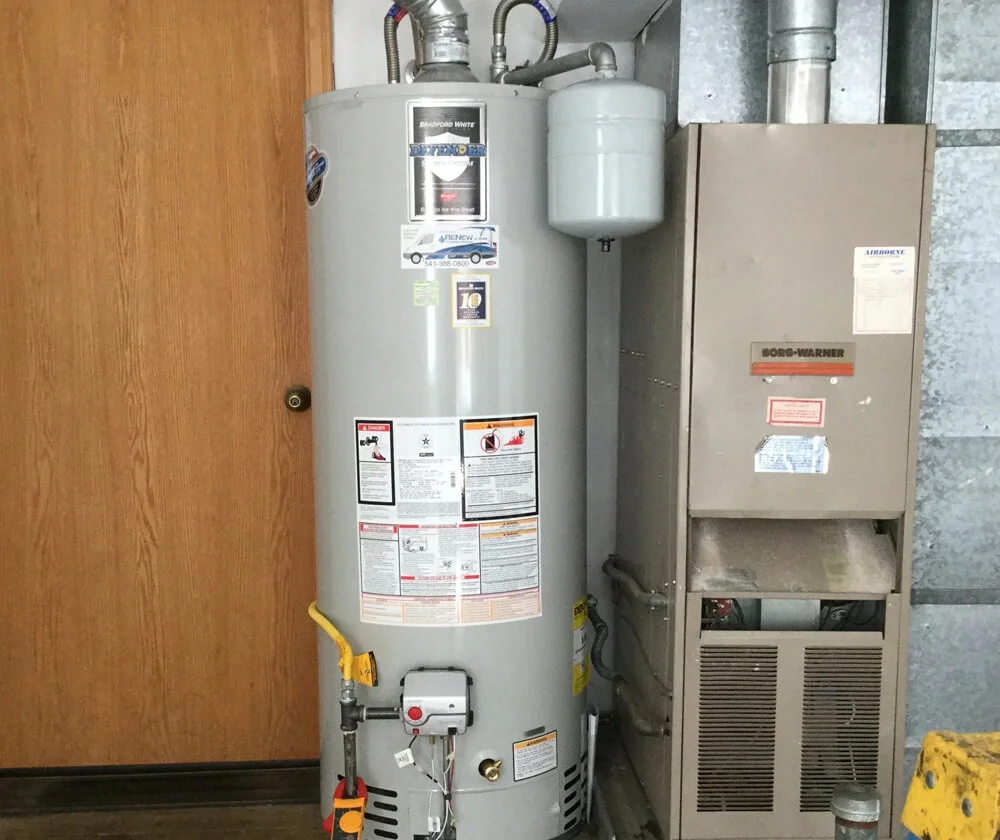 Water heater beside a furnace